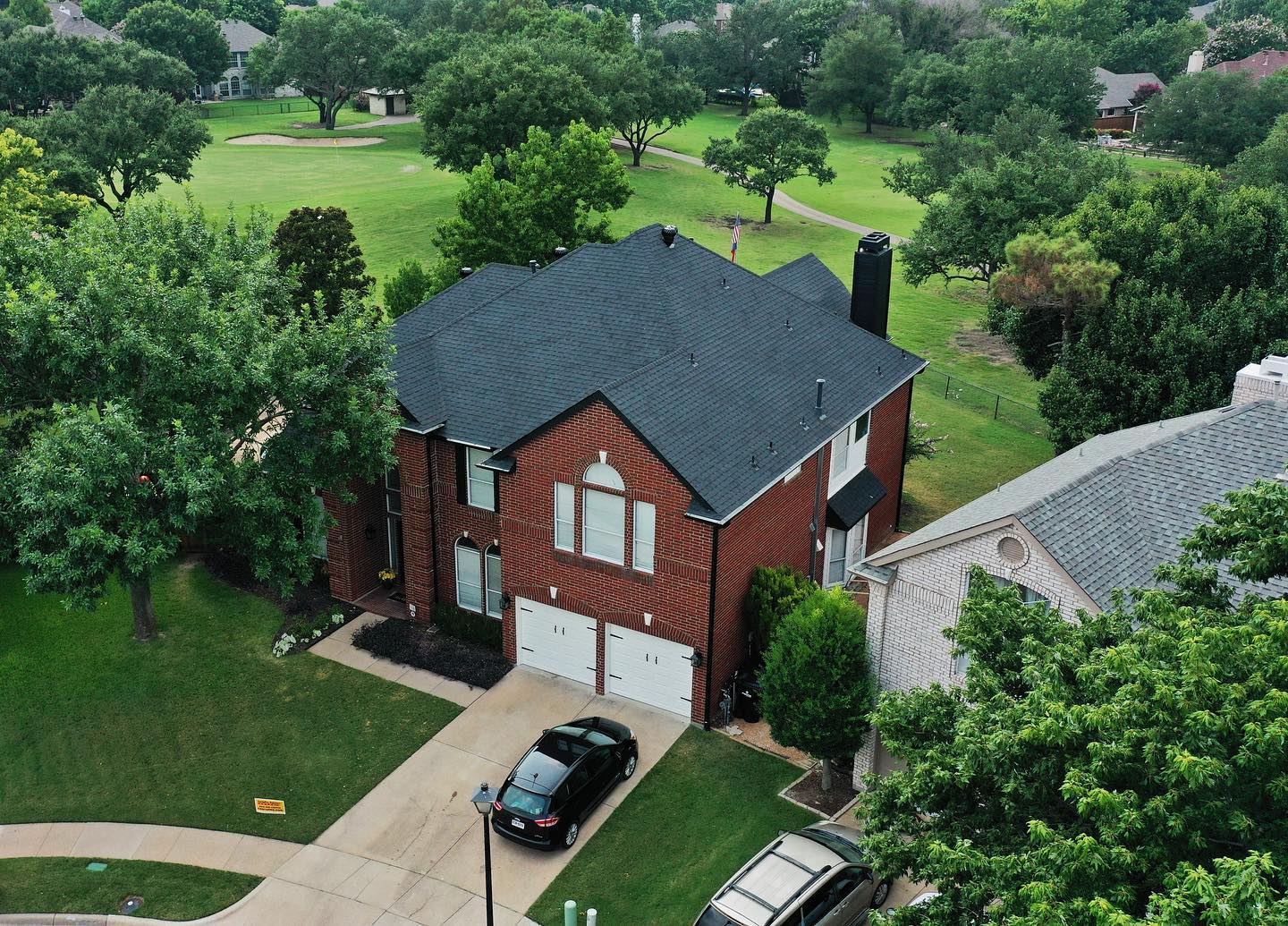 Completed Blue Roofing shingle roof on a North Texas house